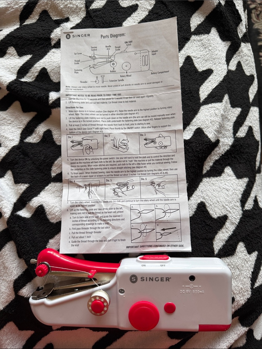Singer Handheld Mini Sewing Machine in White & Red. Never used